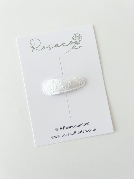 White Embroidered Snap Clip